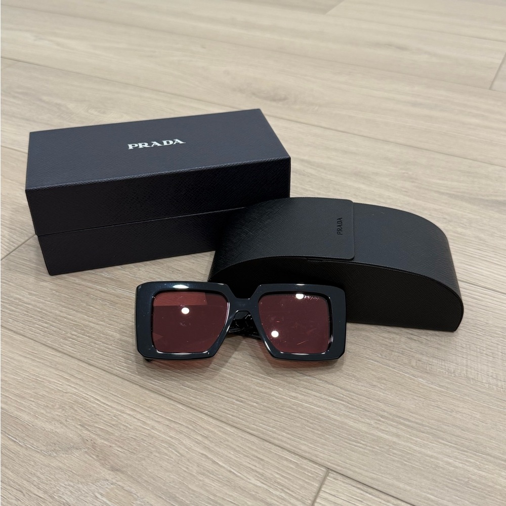 Prada Black Sunglasses with Red/brown Lenses